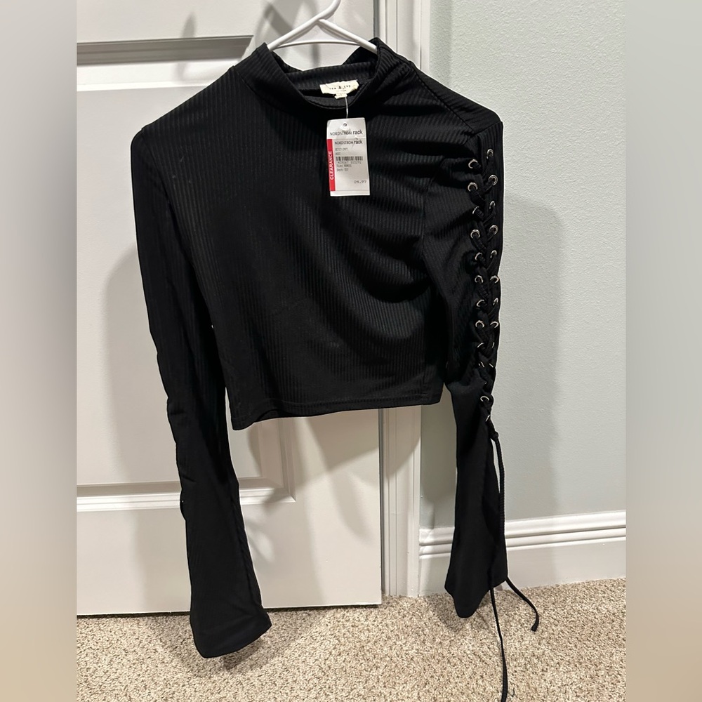 Cropped black shirt with tied arms
